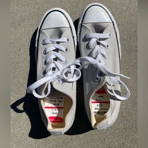 Light gray converse all star low tops